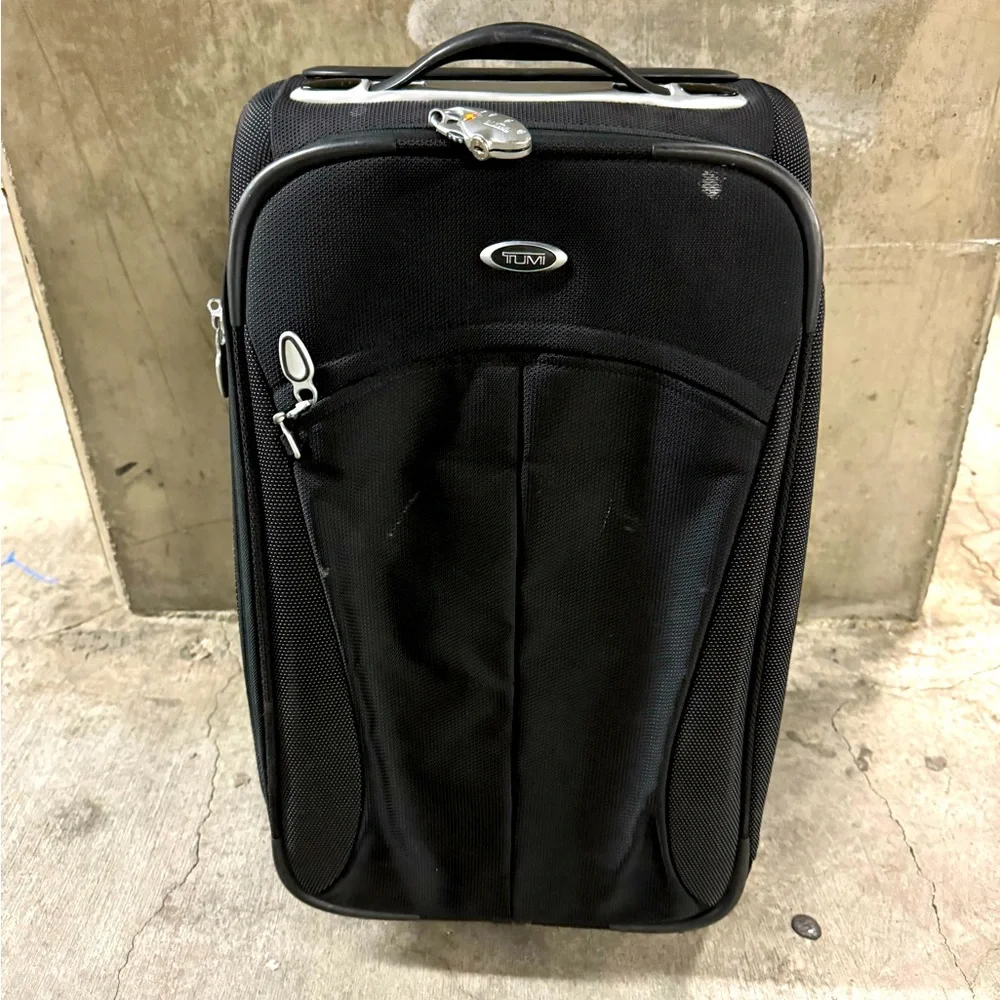 TUMI Carry On Rolling Suitcase